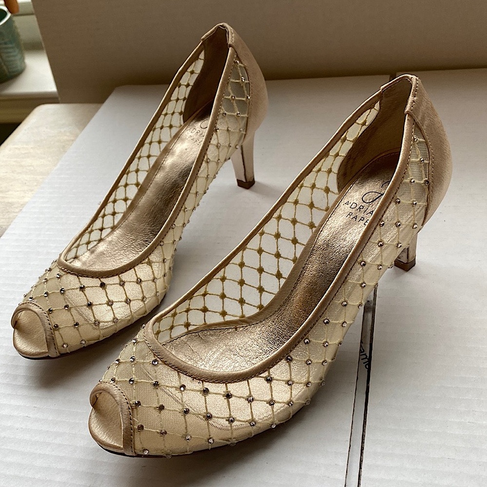Adrianna Papell light gold heels. Only worn once and are absolutely gorgeous.